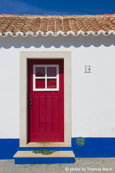 Red door in Porto Covo, Alentejo
