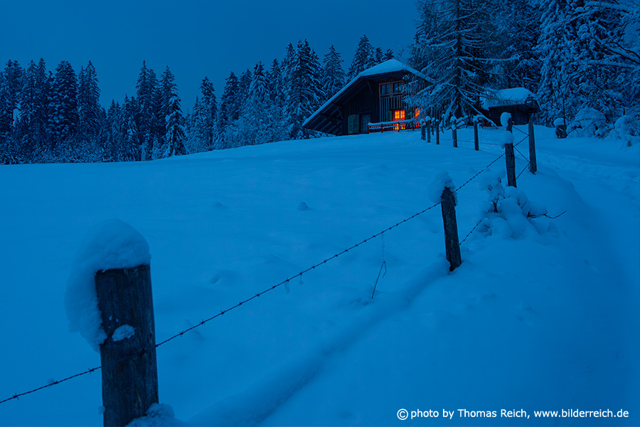 Mountain hut with snow in winter